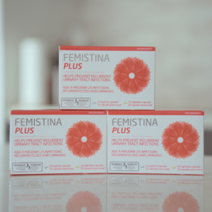 Three boxes of Femistina Plus supplement stacked together, a product recognized by the Society of Obstetricians and Gynaecologists of Canada that helps prevent recurrent UTI infections